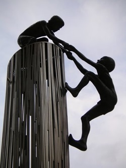 Man Helping Man sculpture by Harold Kimmelman - 1976